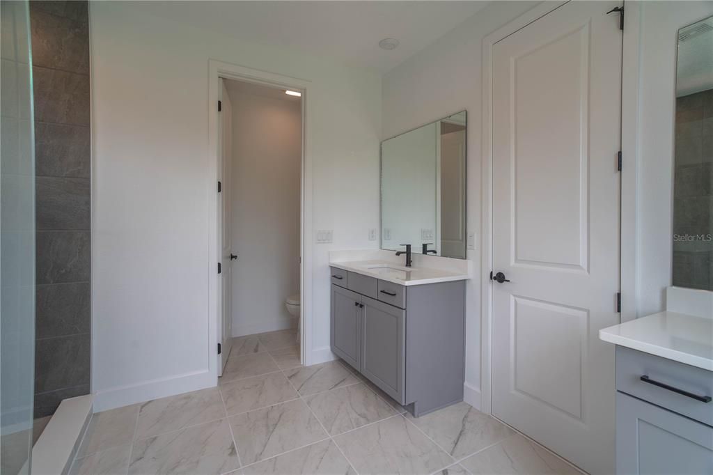 Bathroom, Dual Sink Vanities, Interior, Marble, Recessed Lighting