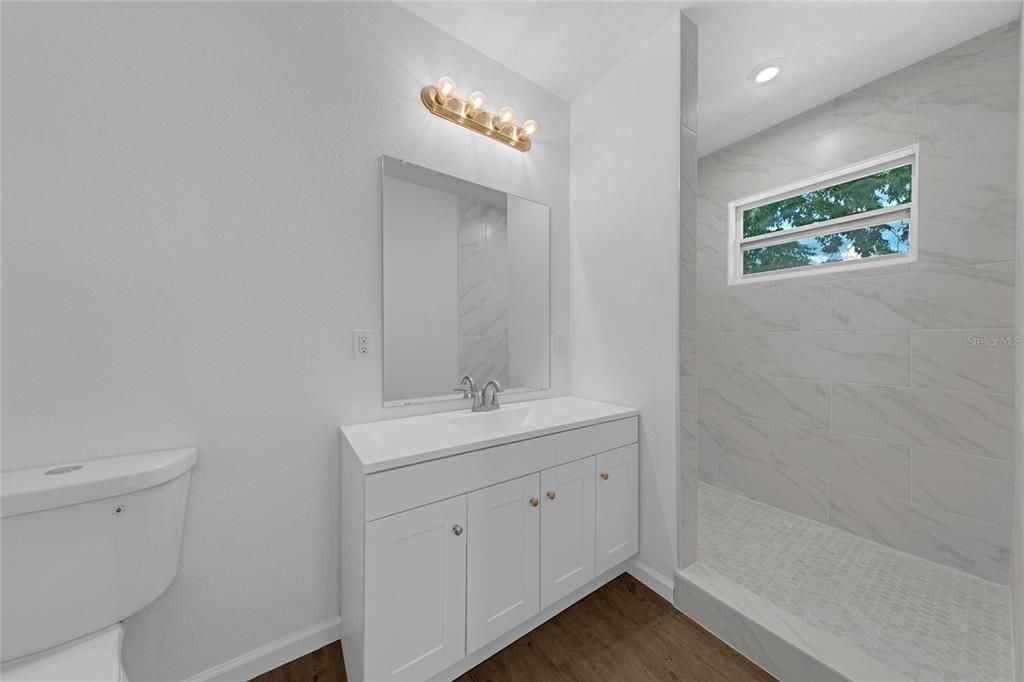 Bathroom, Interior, Marble Walls, Recessed Lighting, Wood Texture Flooring