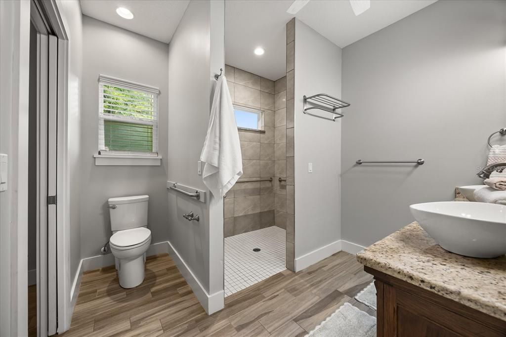 Bathroom, Glass Shower, Interior, Recessed Lighting, Wood Texture Flooring