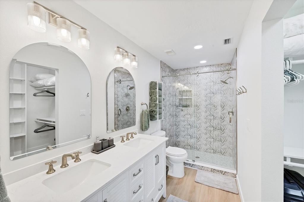 Bathroom, Dual Sink Vanities, Glass Shower, Interior, Recessed Lighting, Wood Texture Flooring