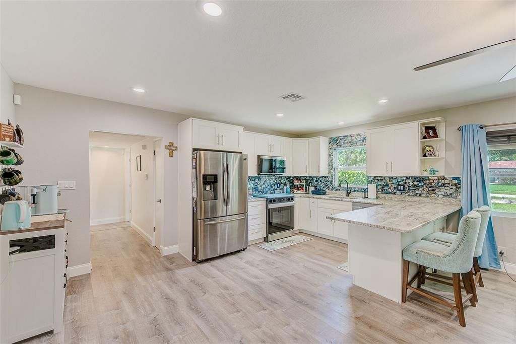 Interior, Kitchen, Recessed Lighting, Stainless Steel Appliances, Wood Texture Flooring