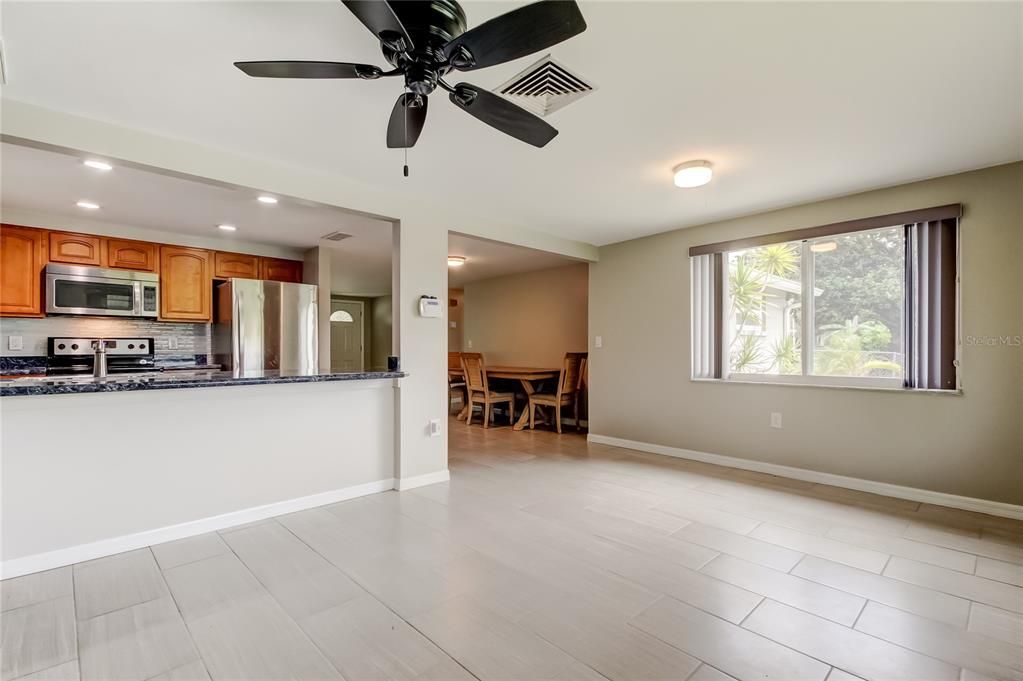 Dining room, Interior, Kitchen, Recessed Lighting, Stainless Steel Appliances, Wood Texture Flooring
