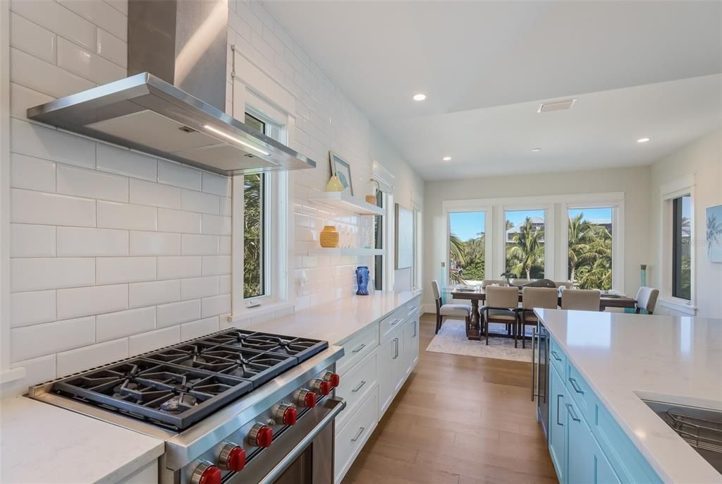 Dining room, Interior, Kitchen, Recessed Lighting, Stainless Steel Appliances, Wood Texture Flooring