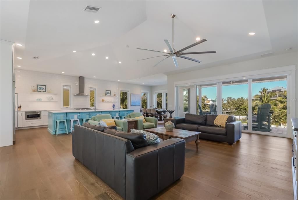 Dining room, Interior, Kitchen, Living room, Recessed Lighting, Stainless Steel Appliances, Wood Texture Flooring