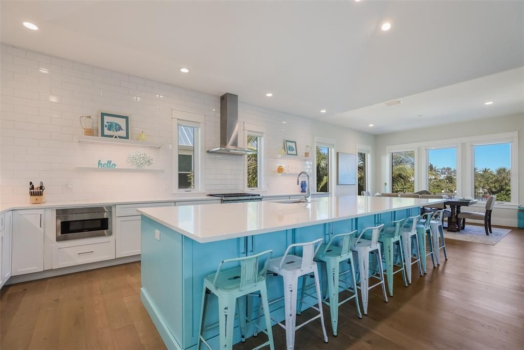 Dining room, Interior, Kitchen, Recessed Lighting, Stainless Steel Appliances, Wood Texture Flooring