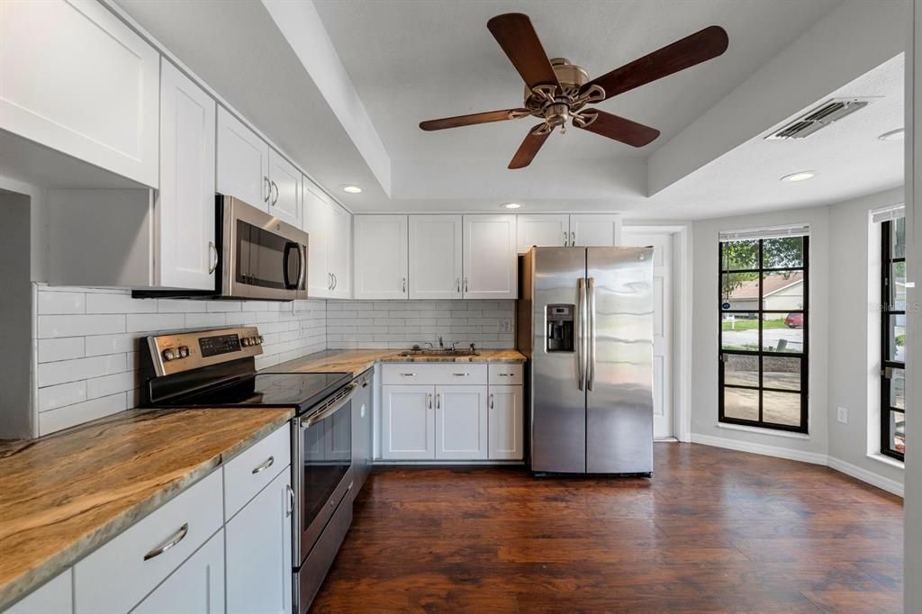 Interior, Kitchen, Recessed Lighting, Stainless Steel Appliances, Wood Texture Flooring