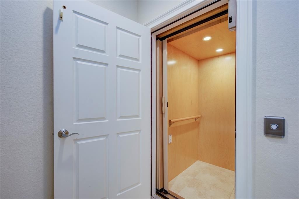 Elevator, Interior, Recessed Lighting, Wooden Ceilings, Wooden Walls