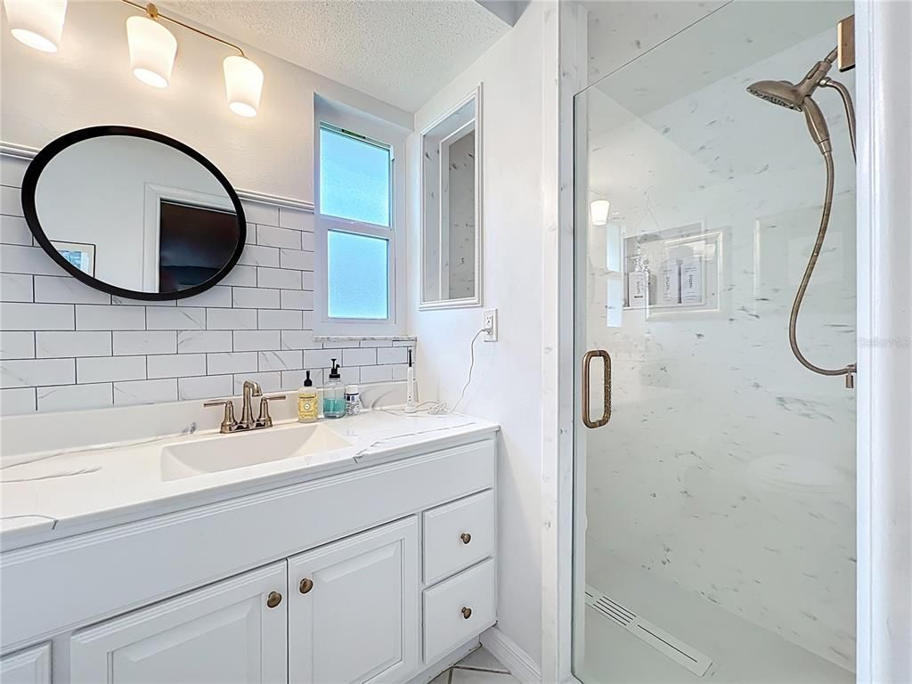 Bathroom, Dual Sink Vanities, Glass Shower, Interior, Marble Walls