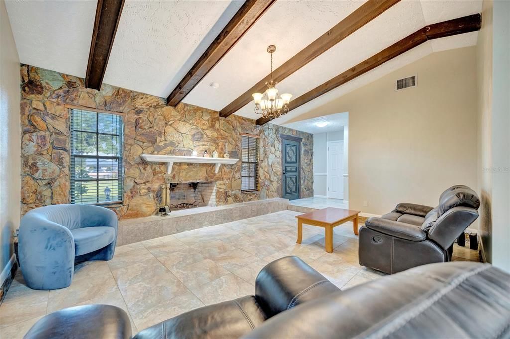 Chandelier, Fireplace, Interior, Stone Walls, Wooden Beams