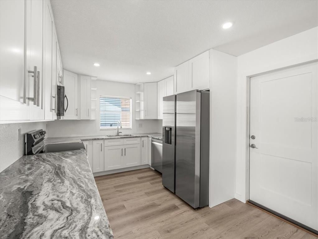 Interior, Kitchen, Recessed Lighting, Stainless Steel Appliances, Wood Texture Flooring