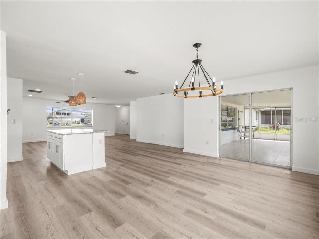 Chandelier, Empty room, Interior, Kitchen, Pendant Lights, Recessed Lighting, Wood Texture Flooring