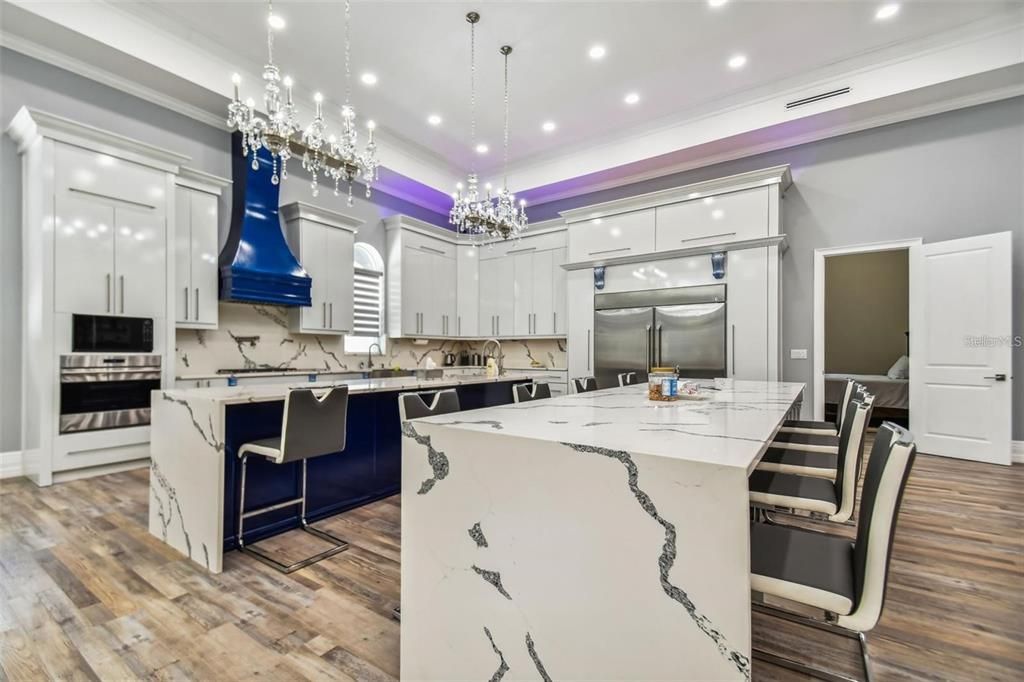 Chandelier, Interior, Kitchen, Pendant Lights, Recessed Lighting, Stainless Steel Appliances, Wood Texture Flooring