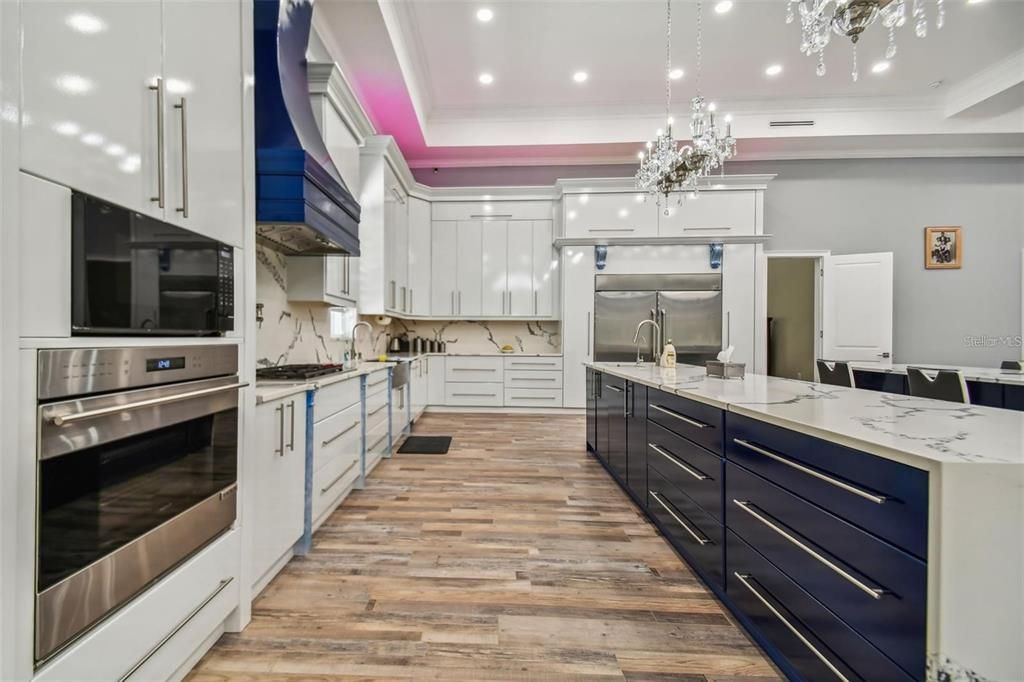 Chandelier, Interior, Kitchen, Pendant Lights, Recessed Lighting, Stainless Steel Appliances, Wood Texture Flooring
