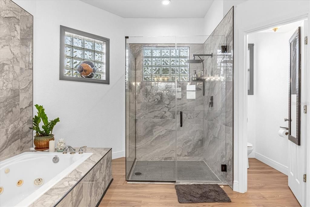 Bathroom, Glass Shower, Interior, Marble Walls, Recessed Lighting, Wood Texture Flooring