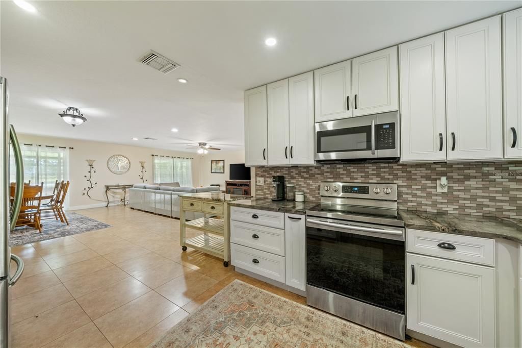 Dining room, Interior, Kitchen, Living room, Recessed Lighting, Stainless Steel Appliances