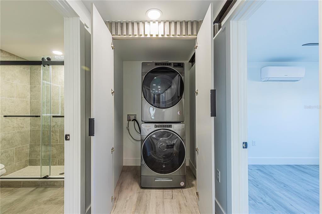 Bathroom, Glass Shower, Interior, Utility Closets, Washer, Wood Texture Flooring