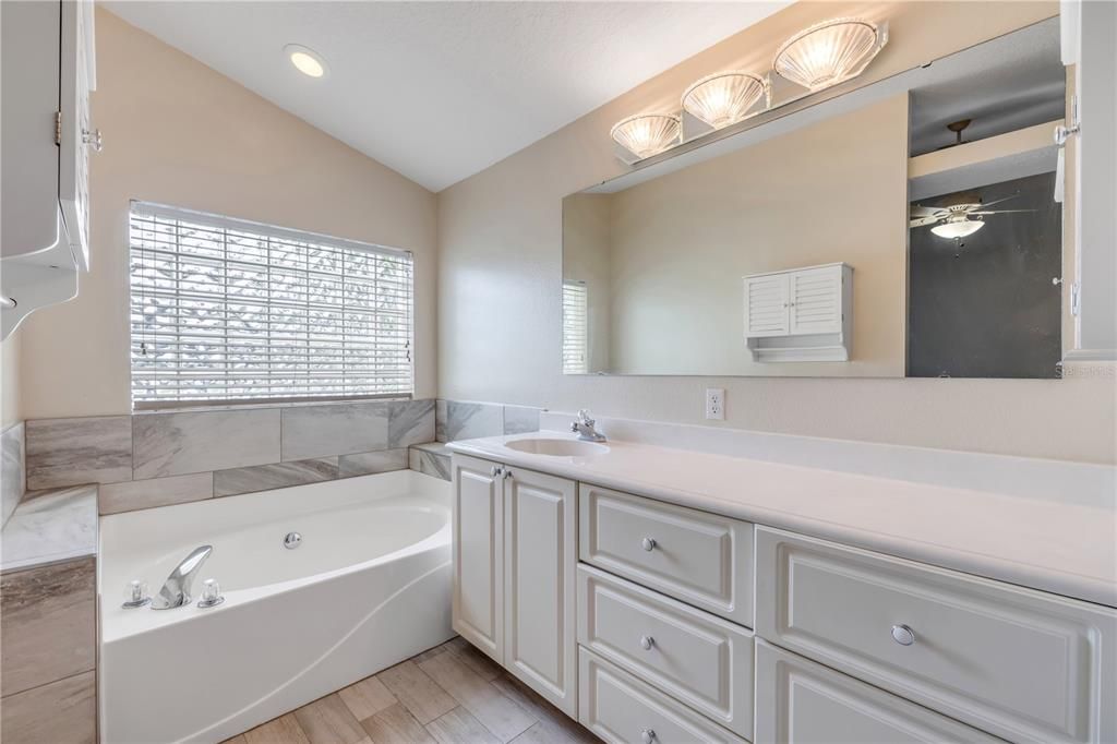 Bathroom, Dual Sink Vanities, Interior, Recessed Lighting, Wood Texture Flooring