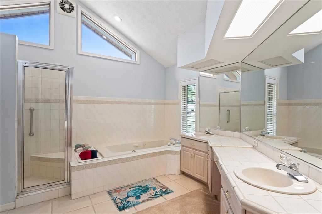 Bathroom, Dual Sink Vanities, Glass Shower, Interior, Recessed Lighting, Tile Countertops