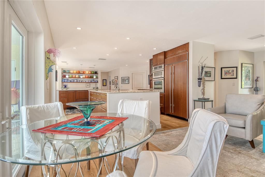 Dining room, Interior, Kitchen, Recessed Lighting, Stainless Steel Appliances, Wood Texture Flooring