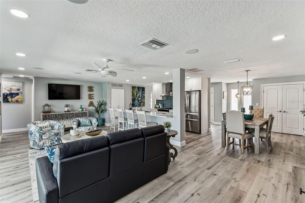 Dining room, Interior, Kitchen, Living room, Pendant Lights, Recessed Lighting, Stainless Steel Appliances, Wood Texture Flooring