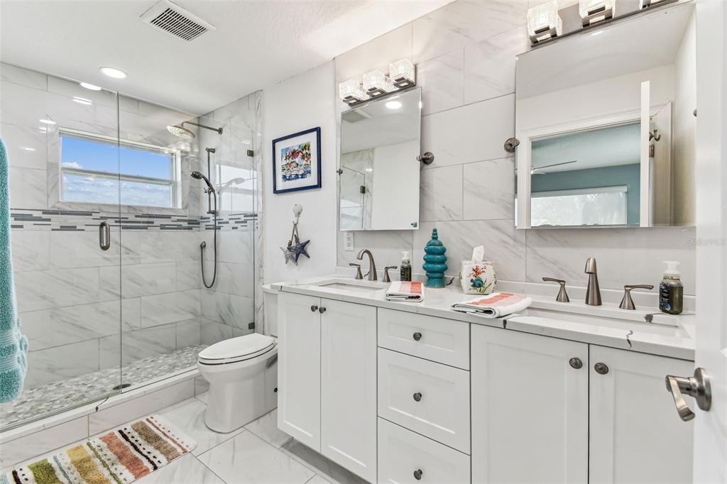 Bathroom, Dual Sink Vanities, Glass Shower, Interior, Marble, Marble Walls, Recessed Lighting