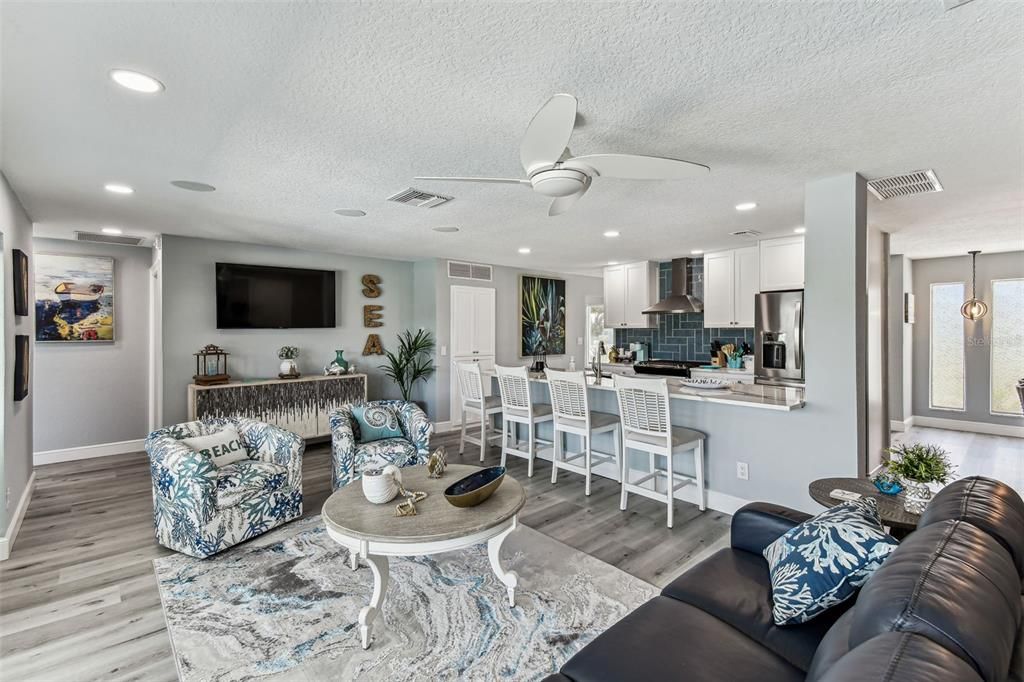 Dining room, Interior, Kitchen, Living room, Recessed Lighting, Stainless Steel Appliances, Wood Texture Flooring
