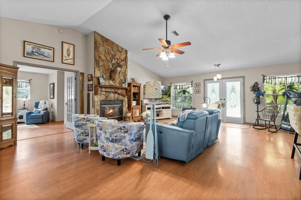 Fireplace, Interior, Living room, Pendant Lights, Stone Walls, Wood Texture Flooring