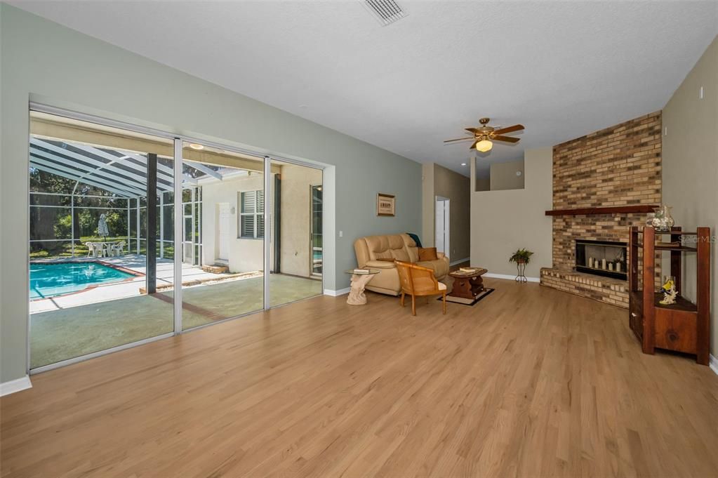 Fireplace, Interior, Living room, Pool, Stone Walls, Wood Texture Flooring