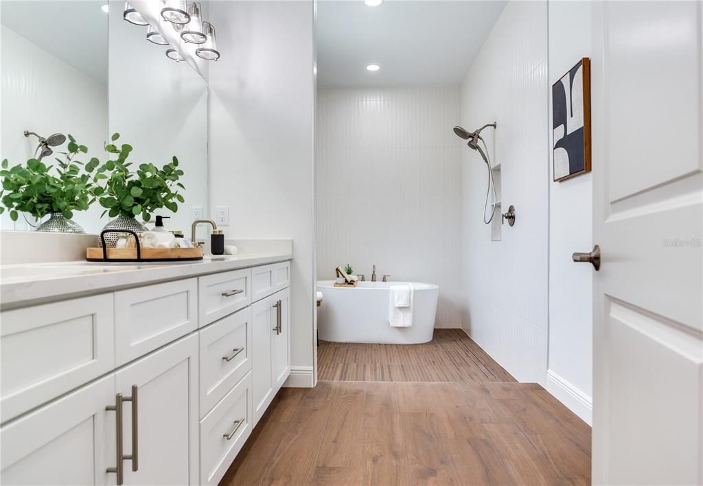 Bathroom, Dual Sink Vanities, Free Standing Baths, Interior, Recessed Lighting, Wood Texture Flooring