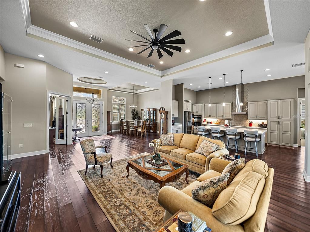 Dining room, Interior, Kitchen, Living room, Pendant Lights, Recessed Lighting, Stainless Steel Appliances, Wood Texture Flooring