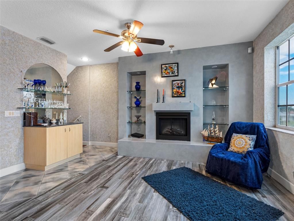 Fireplace, Interior, Recessed Lighting, Wood Texture Flooring