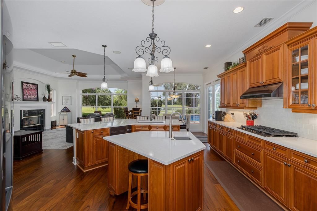 Chandelier, Fireplace, Interior, Kitchen, Pendant Lights, Recessed Lighting, Wood Texture Flooring