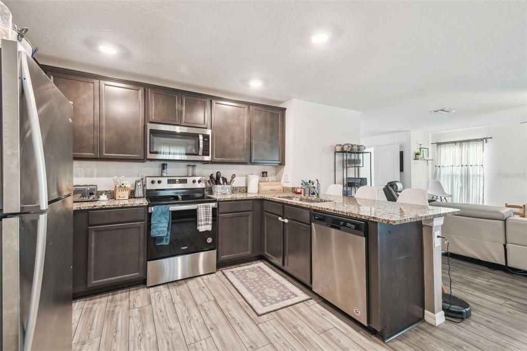 Interior, Kitchen, Living room, Recessed Lighting, Stainless Steel Appliances, Wood Texture Flooring