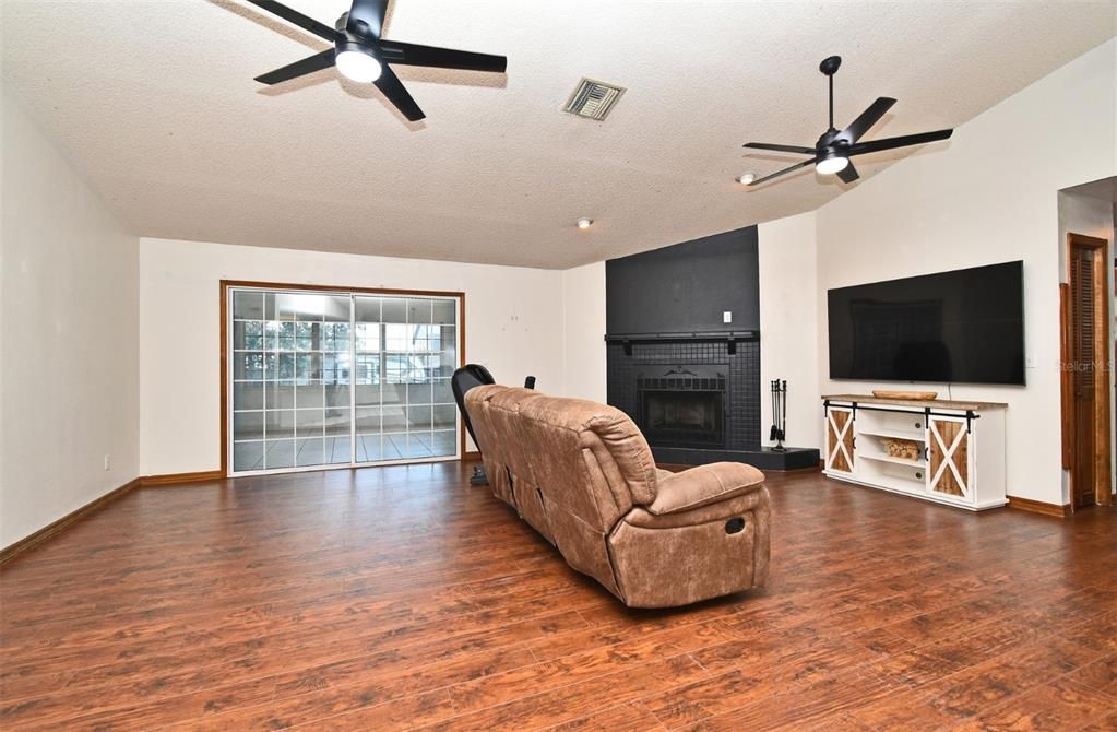 Fireplace, Interior, Recessed Lighting, Wood Texture Flooring