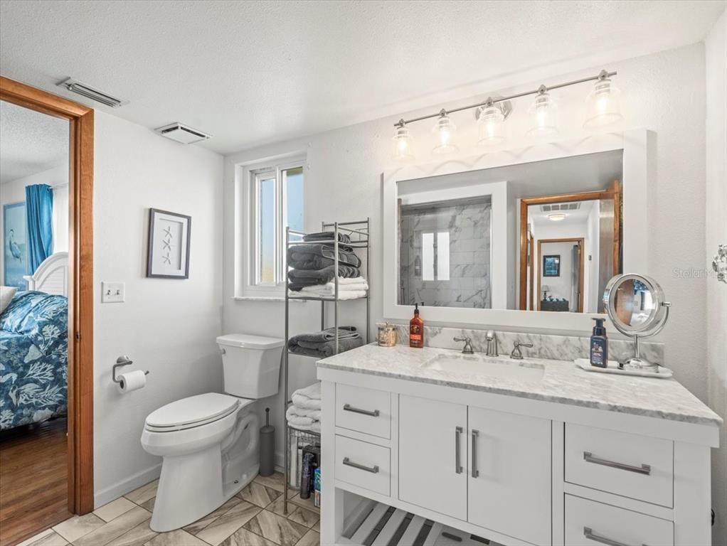 Bathroom, Dual Sink Vanities, Interior, Marble, Wood Texture Flooring