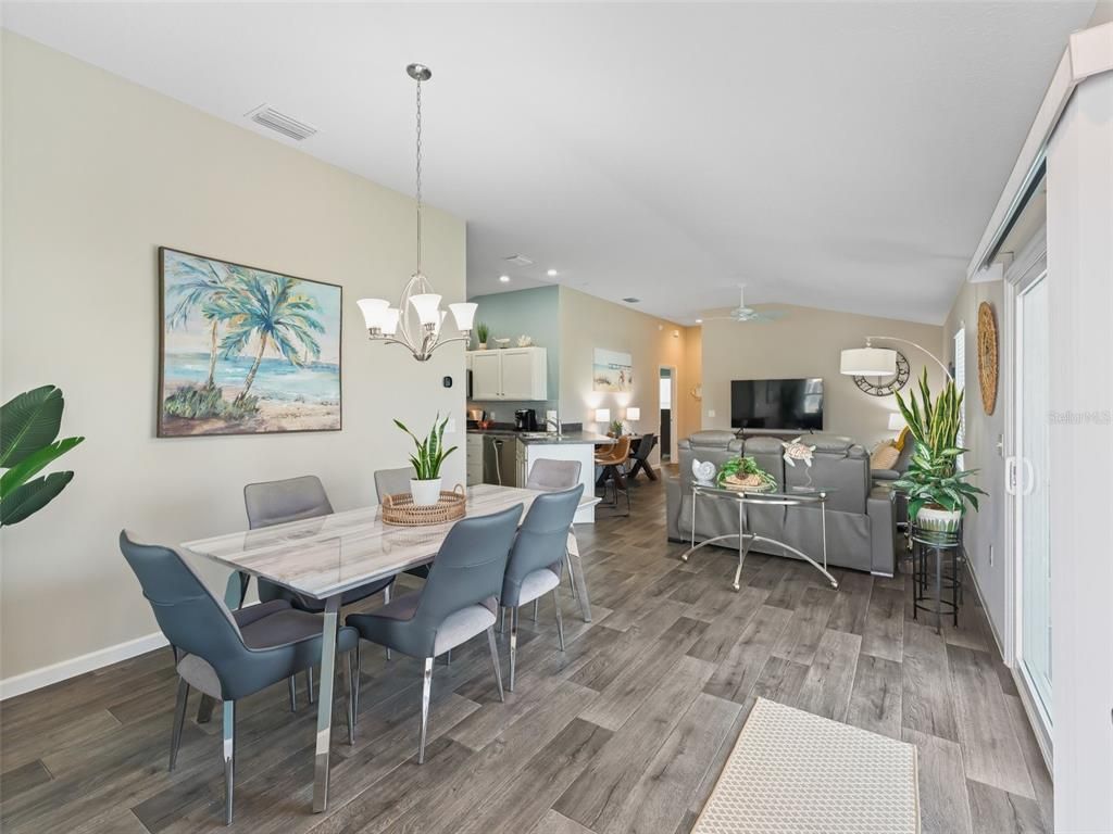 Chandelier, Dining room, Interior, Kitchen, Living room, Pendant Lights, Recessed Lighting, Wood Texture Flooring