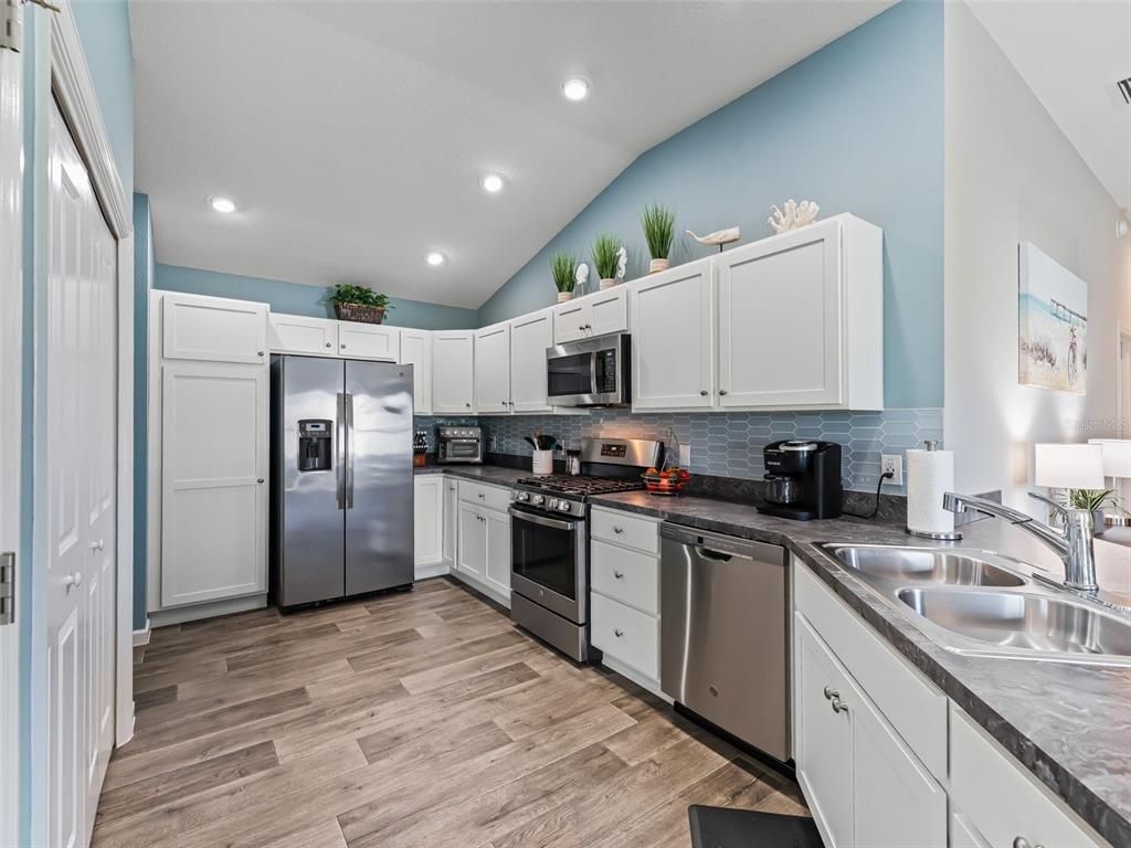 Interior, Kitchen, Recessed Lighting, Stainless Steel Appliances, Wood Texture Flooring