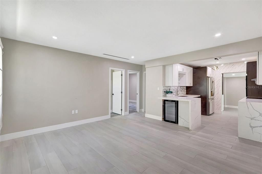 Interior, Kitchen, Marble Walls, Recessed Lighting, Wood Texture Flooring