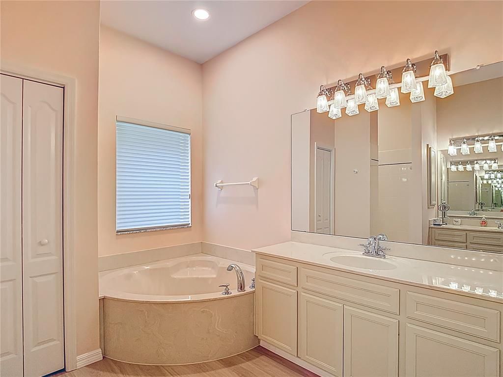 Bathroom, Dual Sink Vanities, Interior, Recessed Lighting, Wood Texture Flooring