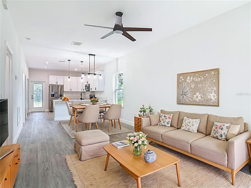 Dining room, Interior, Kitchen, Living room, Pendant Lights, Recessed Lighting, Stainless Steel Appliances, Wood Texture Flooring