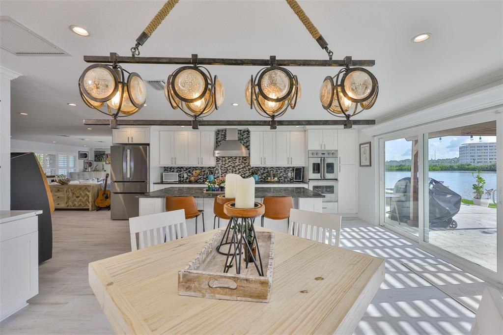 Dining room, Interior, Kitchen, Recessed Lighting, Stainless Steel Appliances, Water, Wood Texture Flooring
