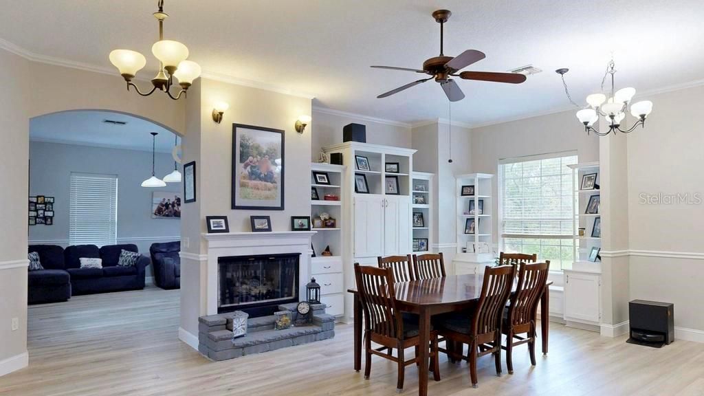 Chandelier, Dining room, Fireplace, Interior, Pendant Lights, Wood Texture Flooring
