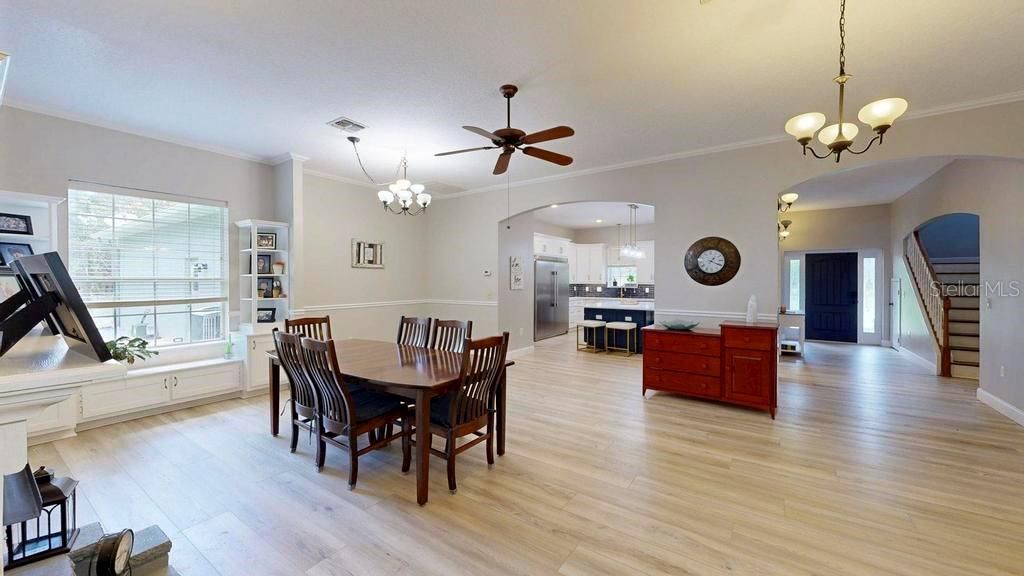 Chandelier, Dining room, Interior, Kitchen, Pendant Lights, Recessed Lighting, Stainless Steel Appliances, Wood Texture Flooring