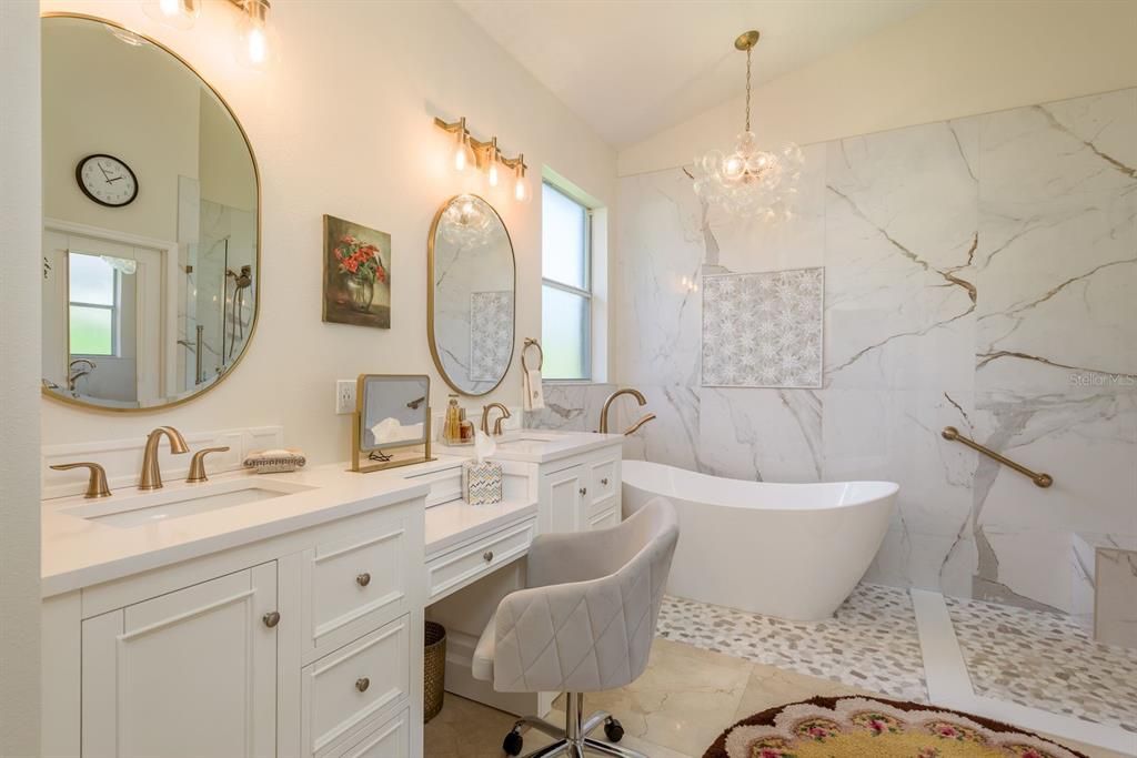 Bathroom, Chandelier, Dual Sink Vanities, Free Standing Baths, Interior, Marble Walls, Pendant Lights