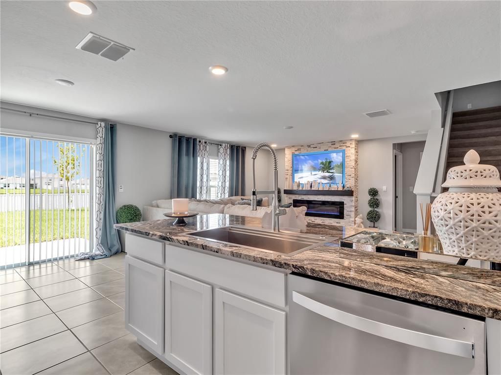 Fireplace, Interior, Kitchen, Recessed Lighting, Stainless Steel Appliances