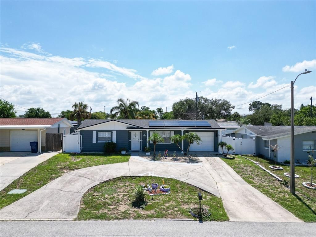 Attached, Exterior, Facade, Solar Panels, Ranch