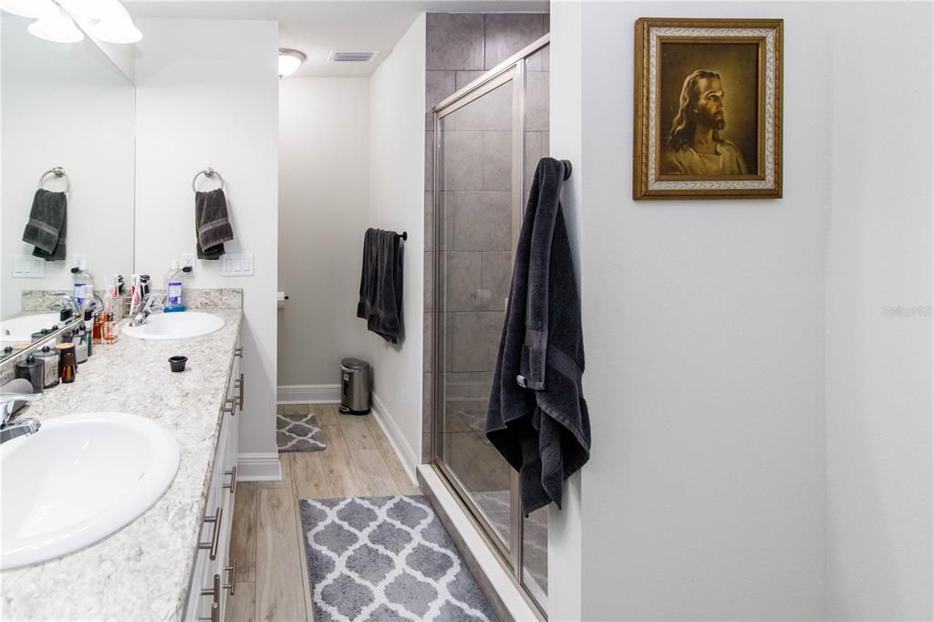 Bathroom, Dual Sink Vanities, Glass Shower, Interior, Wood Texture Flooring