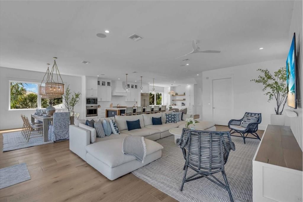 Dining room, Interior, Kitchen, Living room, Pendant Lights, Recessed Lighting, Stainless Steel Appliances, Wood Texture Flooring