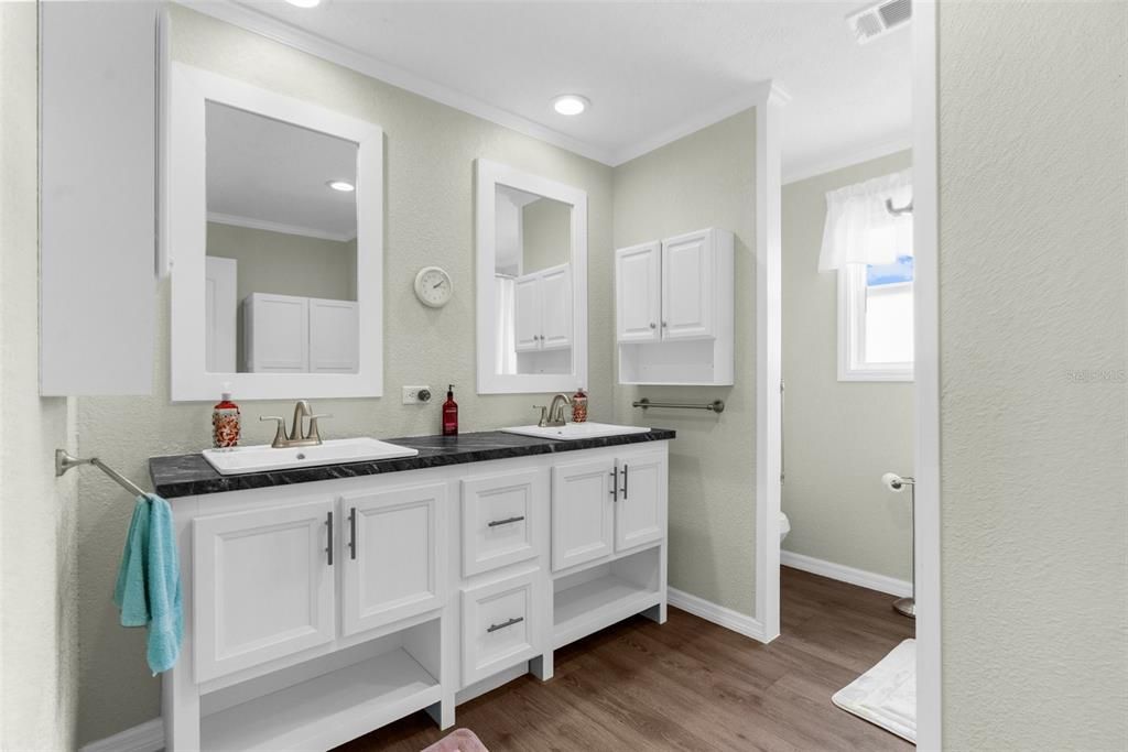 Bathroom, Dual Sink Vanities, Interior, Recessed Lighting, Wood Texture Flooring
