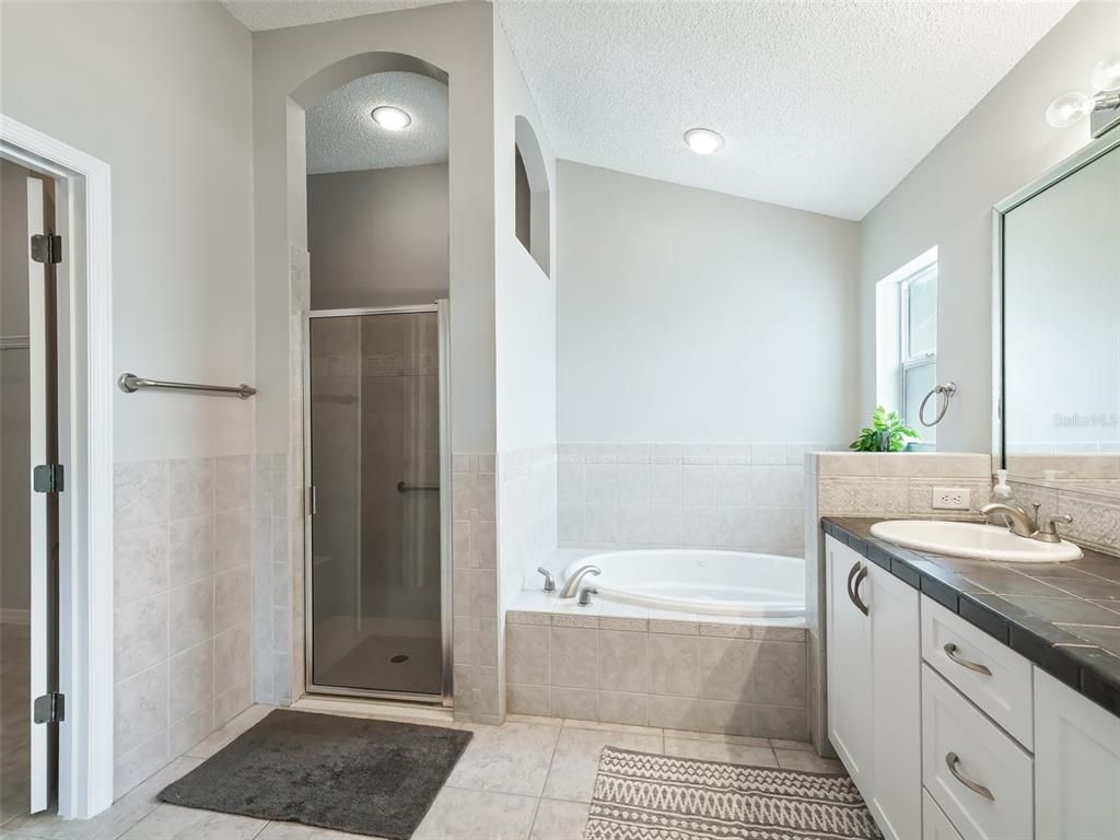 Bathroom, Glass Shower, Interior, Recessed Lighting, Tile Countertops